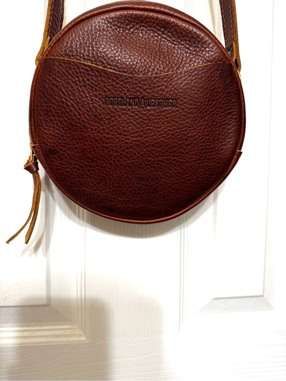 Portland Leather Round Leather Crossbody Bag in Brown